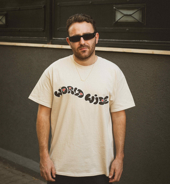Sand WorldWide Tee — back